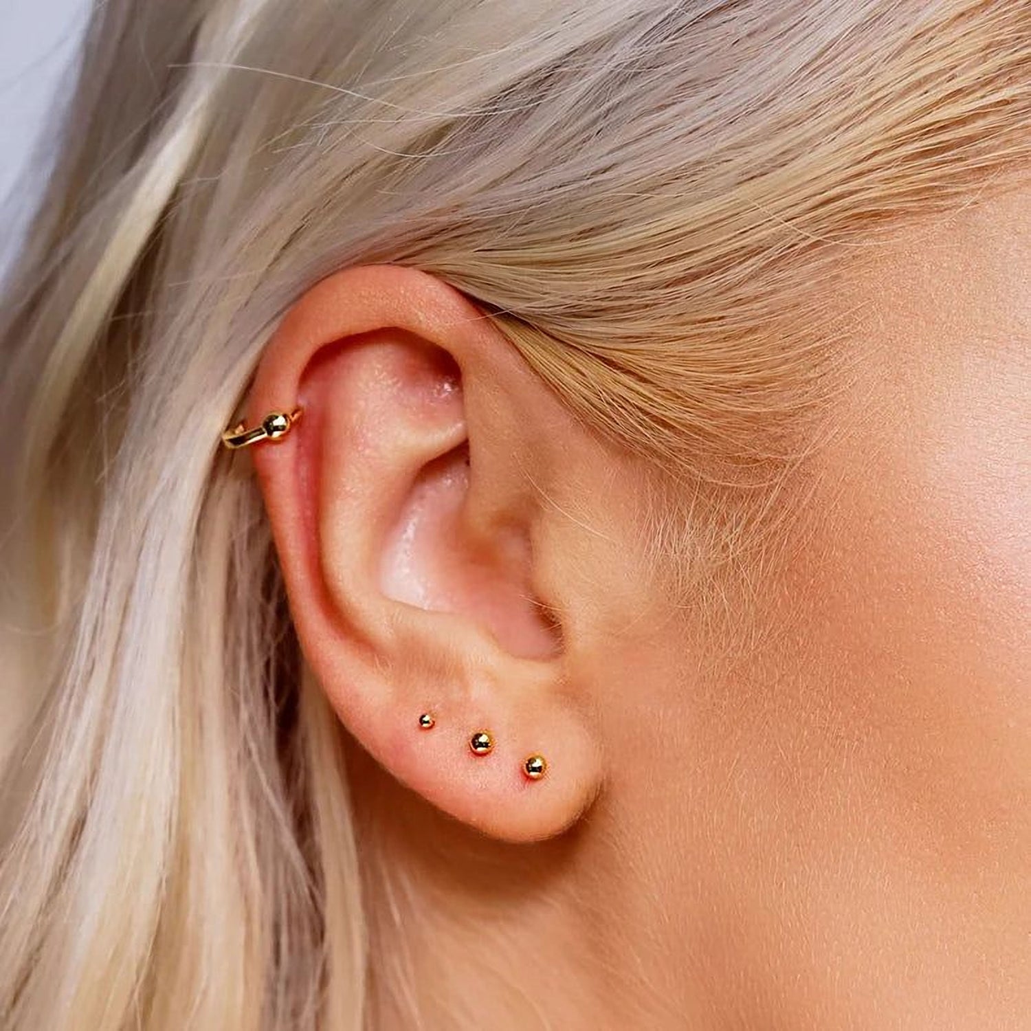 AJJ EVE small gold stud earrings in 18K gold with 1.5mm, 2mm, and 3mm ball designs, perfect for minimalist jewelry.