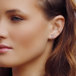 AJJ Bella minimalist silver huggie hoops, small and delicate conch hoop earrings with a sleek, modern design.