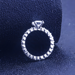 Sterling silver vintage-style emerald cut engagement ring with simulated diamonds, handcrafted by AJJ for weddings and anniversaries.