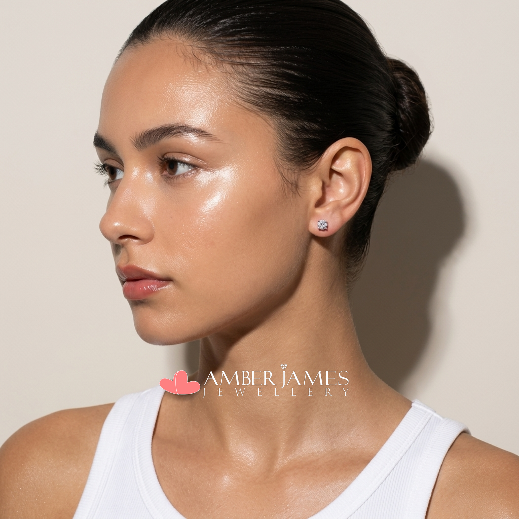 AJJ NEVE tiny stud earrings set featuring round CZ studs, minimalist jewelry for multiple piercings, in a sleek and elegant design.