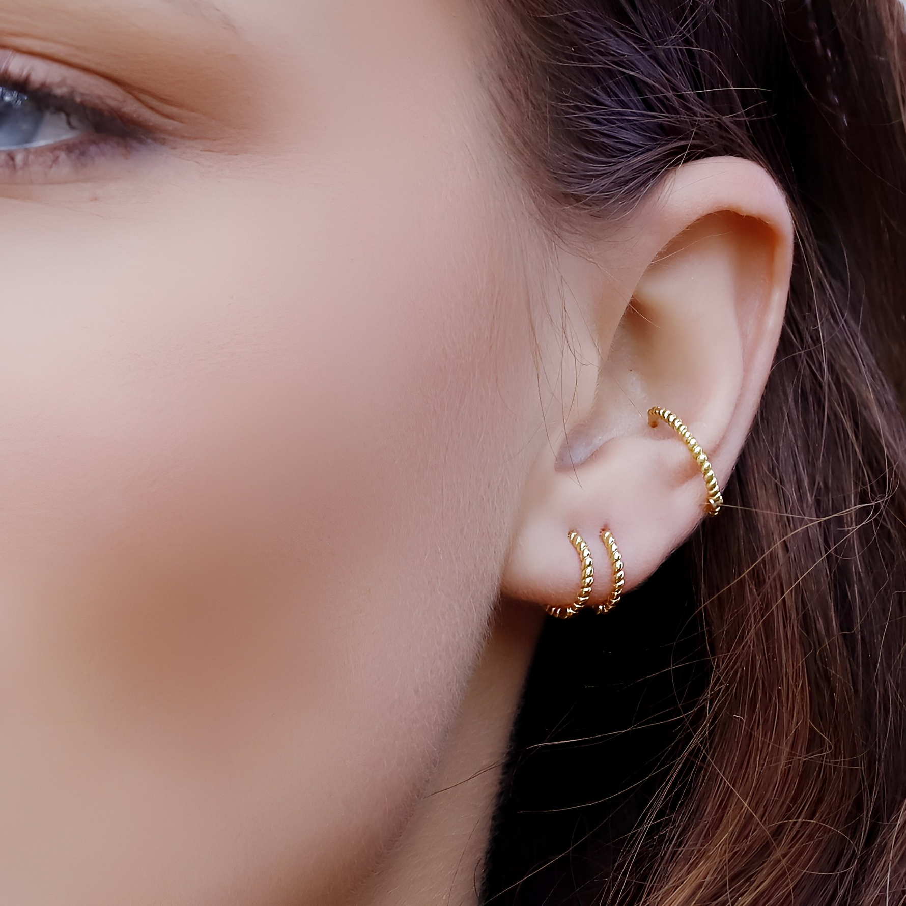 AJJ Bella minimalist silver huggie hoops, small delicate conch earrings, tiny hoop earrings with a sleek, simple design.