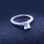 Elegant vintage-style AJJ Lucendra 925 silver wedding band with emerald cut simulated diamond and cubic zirconia accents.
