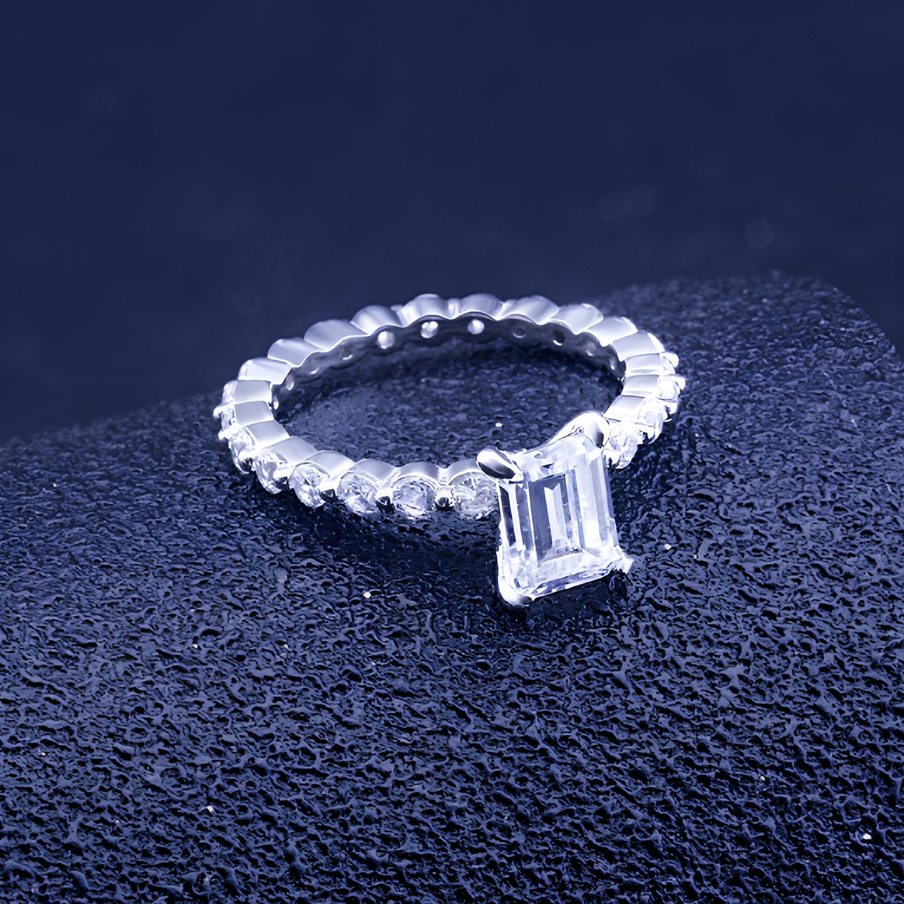 Elegant vintage-style AJJ Lucendra 925 silver wedding band with emerald cut simulated diamond and cubic zirconia accents.