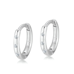 Aurora sterling silver huggie hoop earrings by AJJ, featuring a delicate minimalist design with a polished finish.