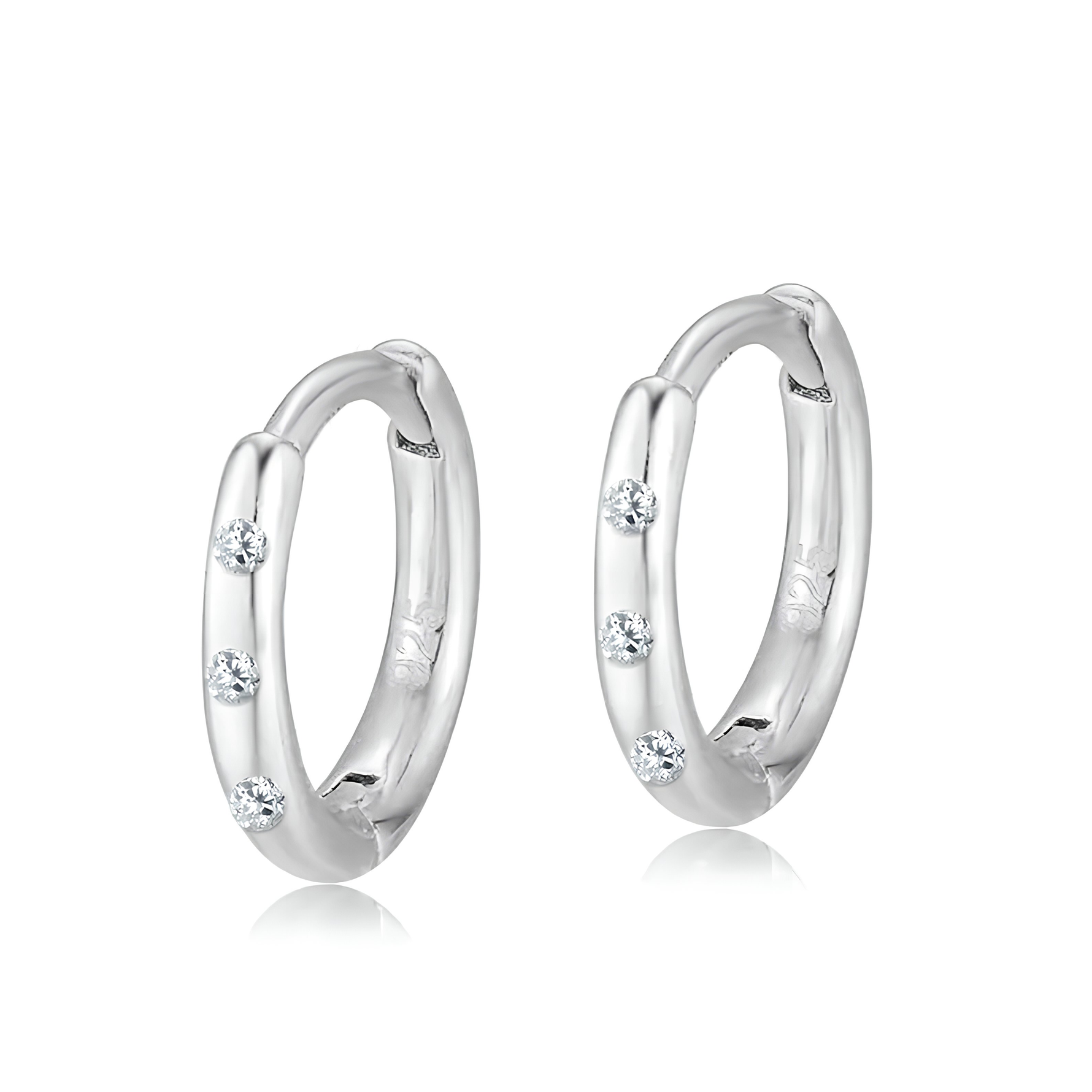 Aurora sterling silver huggie hoop earrings by AJJ, featuring a delicate minimalist design with a polished finish.