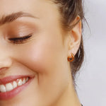 Silver Pentagon Huggie Hoops by AJJ, dainty geometric hoop earrings with a modern pentagon shape.