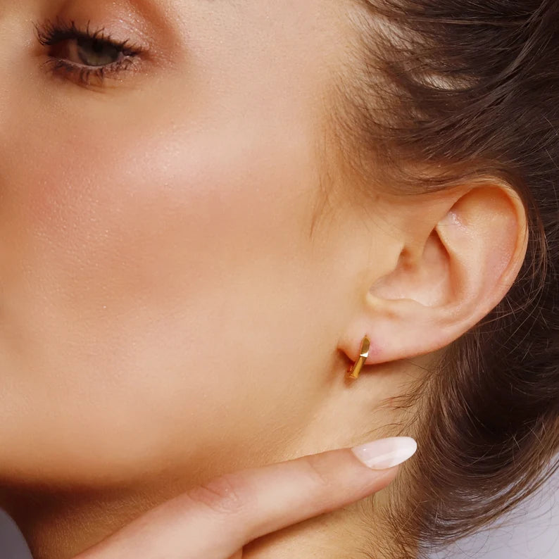 Silver Pentagon Huggie Hoop Earrings by AJJ, geometric dainty hoops with a sleek modern design, perfect for everyday wear.