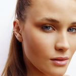 AJJ KIERA minimalist twisted gold huggie hoops, small open silver hoop earrings with dainty twisted design.