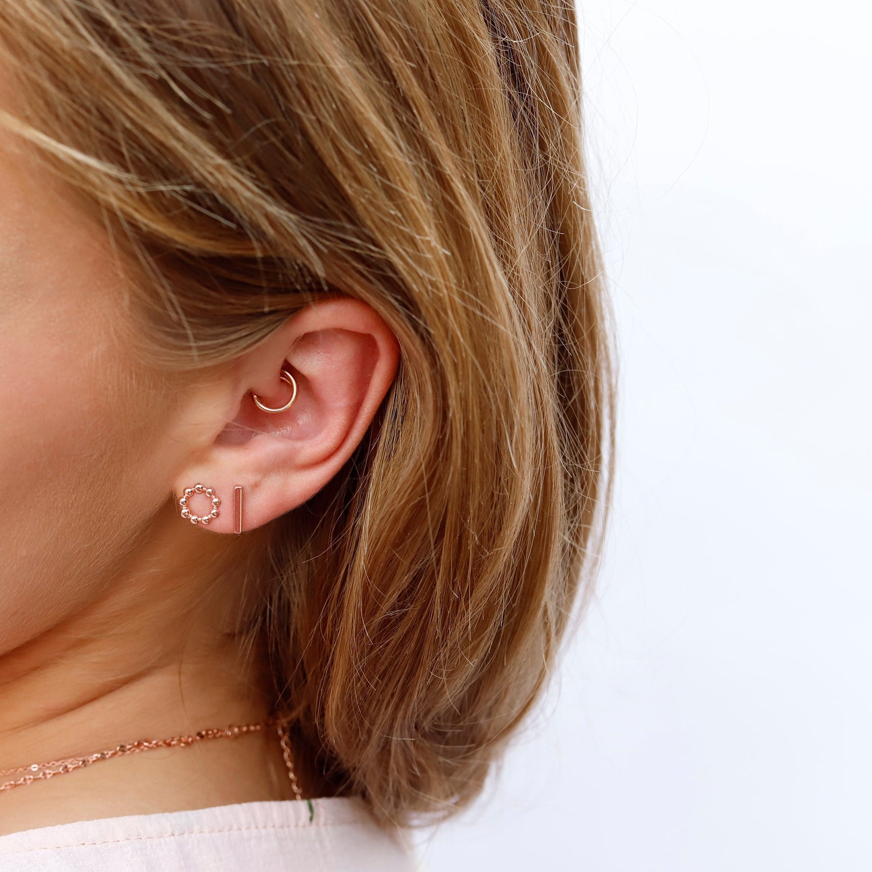 Silver circle stud earrings by AJJ, geometric sterling silver earrings with crystal accents, minimalist and stylish jewelry.