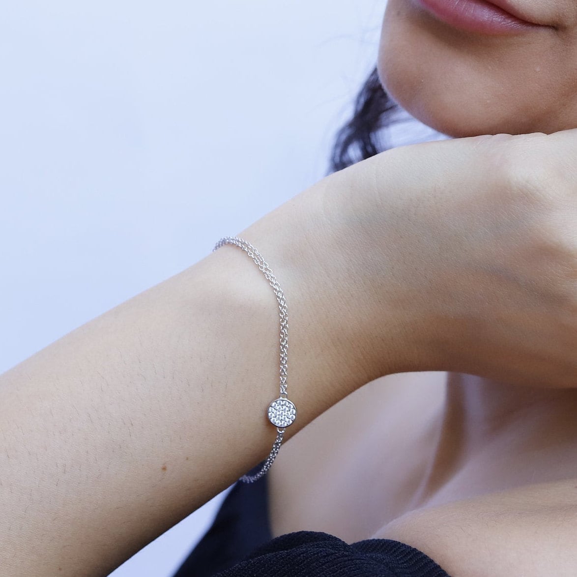 Delicate AJJ sterling silver pave bracelet, featuring elegant layering design and intricate detailing for a refined look.