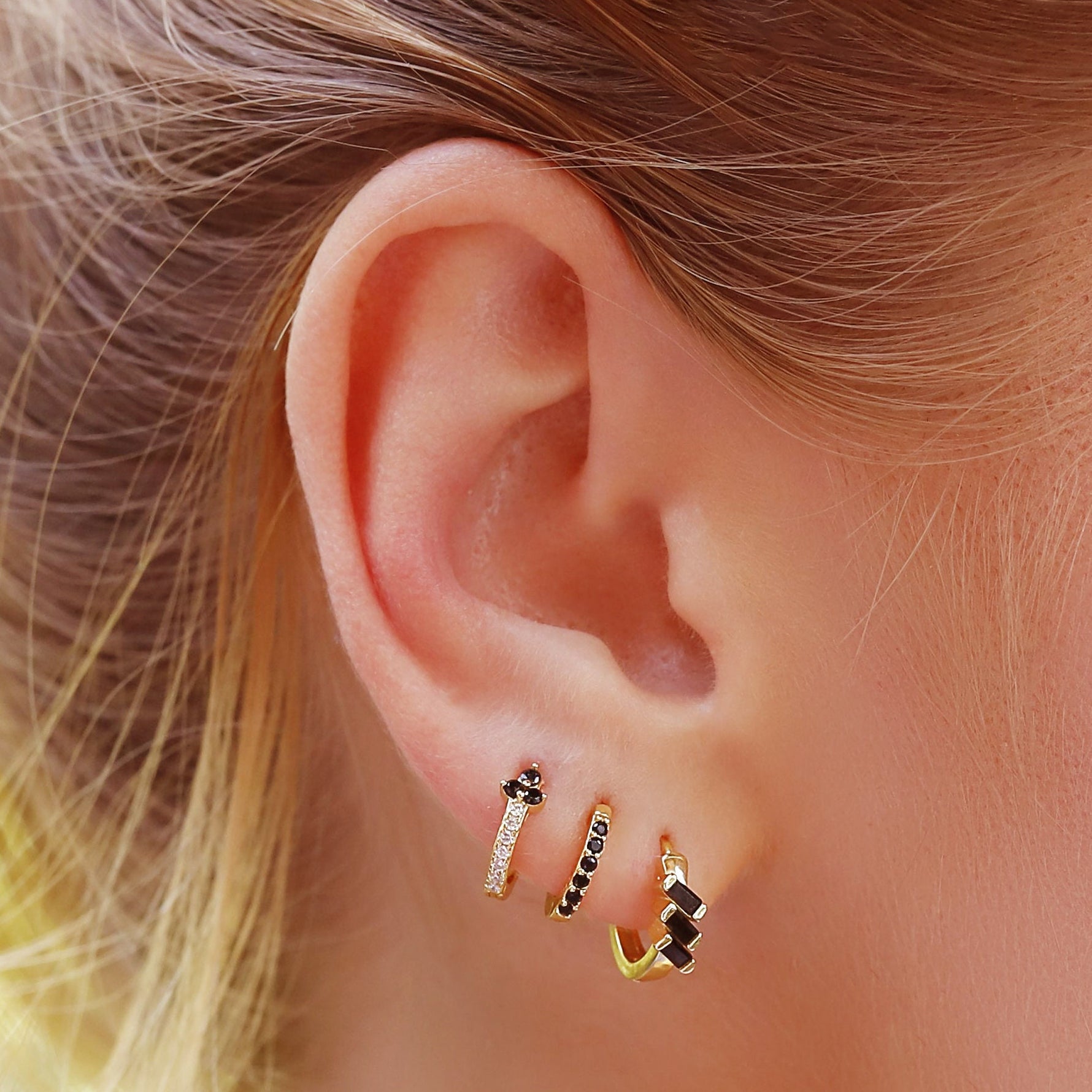 AJJ minimalist silver and gold huggie hoops with dainty flower design, small club hoop earrings for subtle elegance