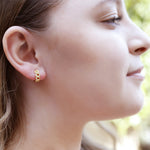 AJJ minimalist silver huggie hoops, small and chunky earrings with a dainty, modern design perfect for everyday wear.