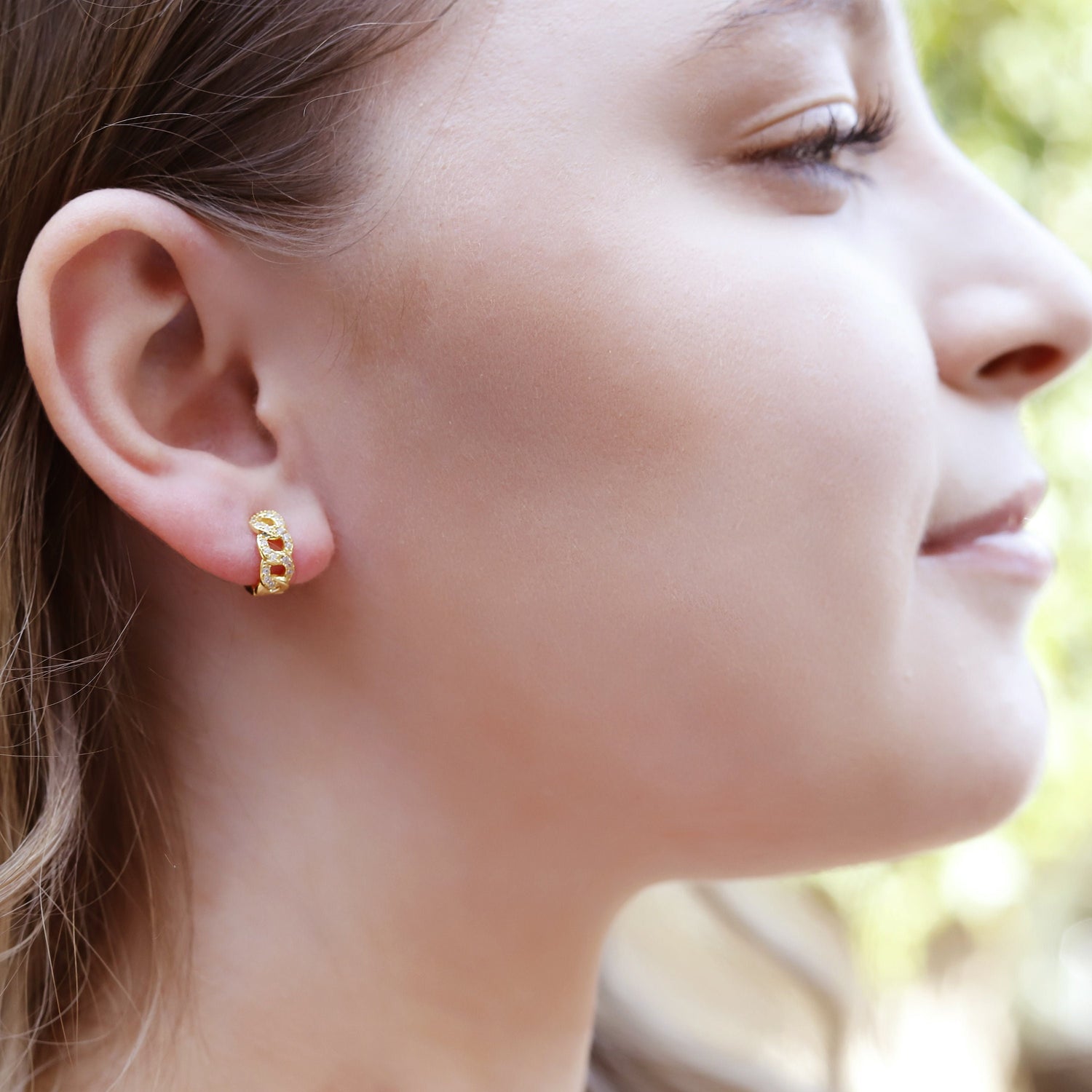 AJJ minimalist silver huggie hoops, small and chunky earrings with a dainty, modern design perfect for everyday wear.