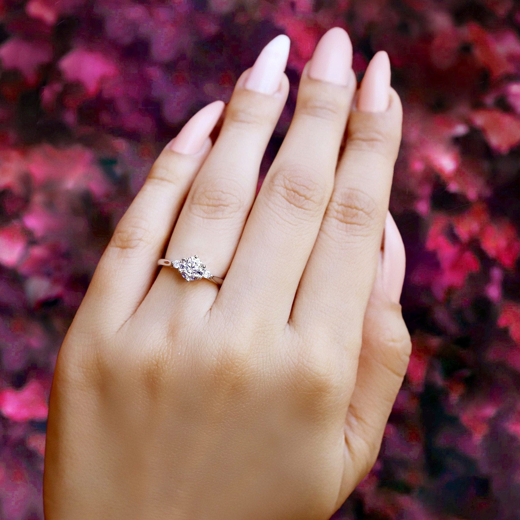 Sterling silver bridal engagement ring by AJJ, featuring a delicate promise ring design for women, available in US and UK sizes.