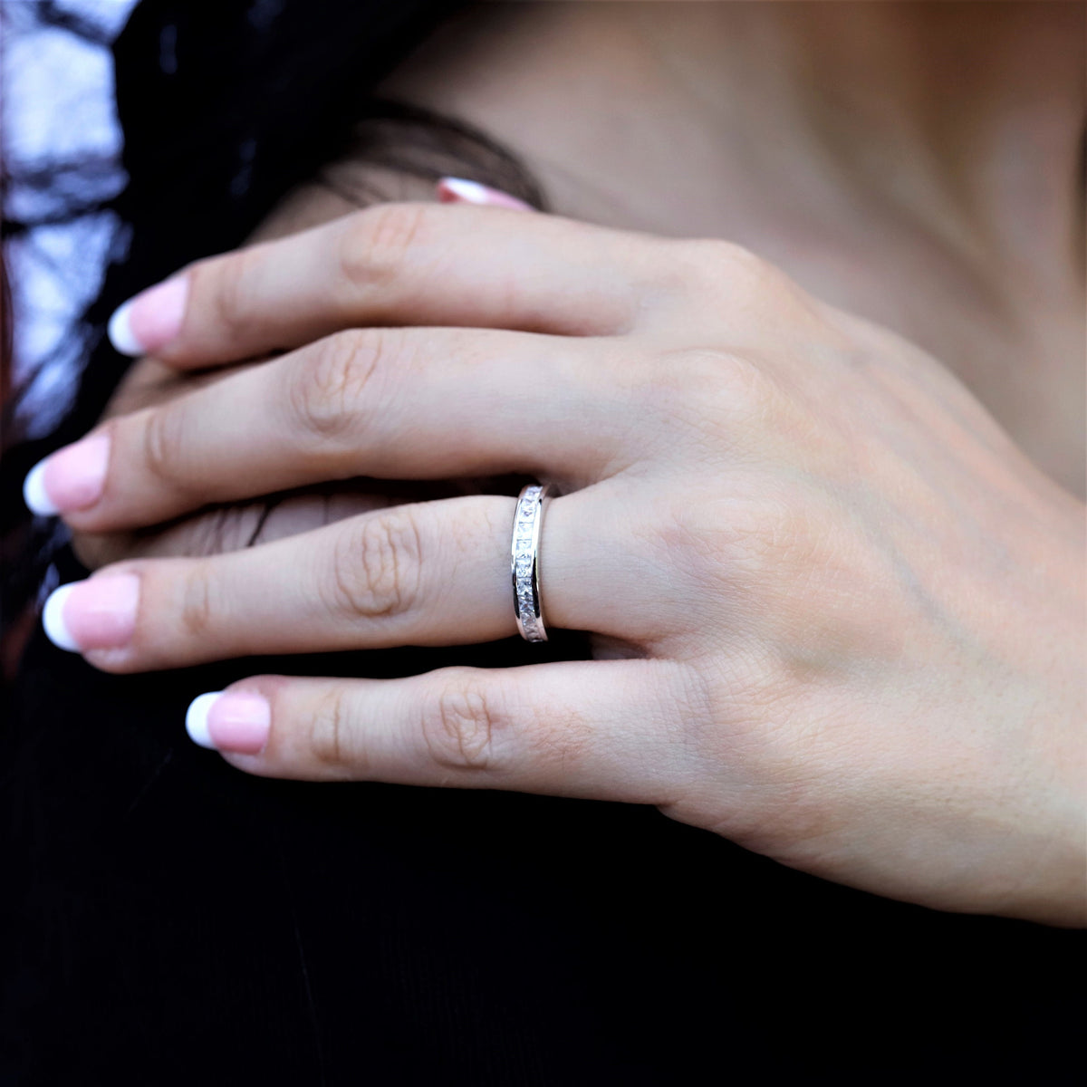 Sterling silver Lottie princess eternity wedding ring band for women, featuring full eternity design with sparkling stones.