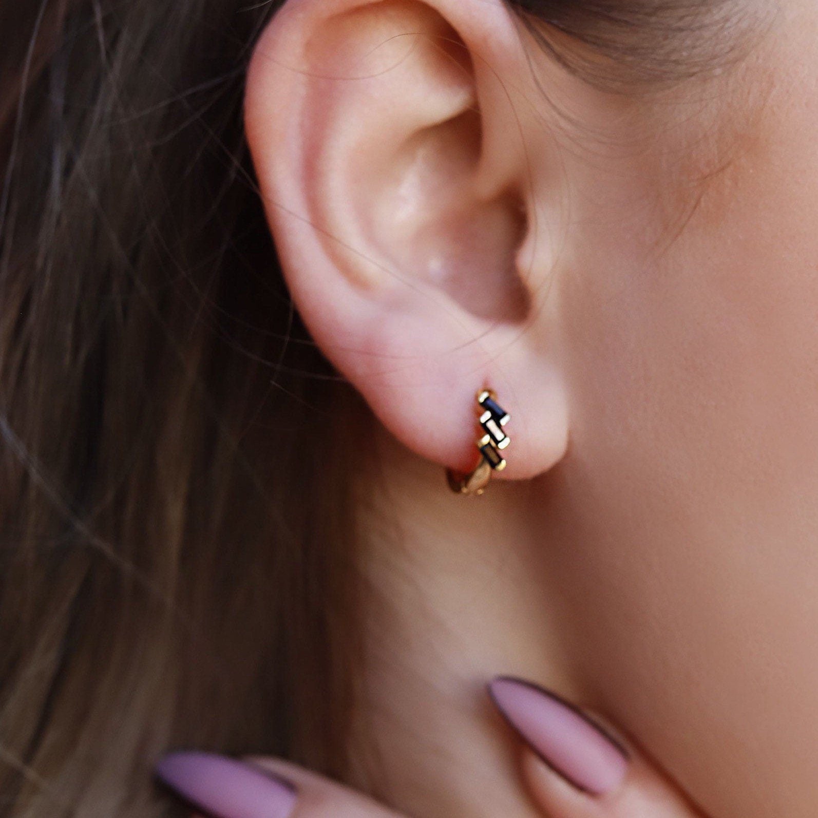 AJJ Poppy minimalist silver huggie hoops, small open dainty hoop earrings for subtle style and everyday wear.