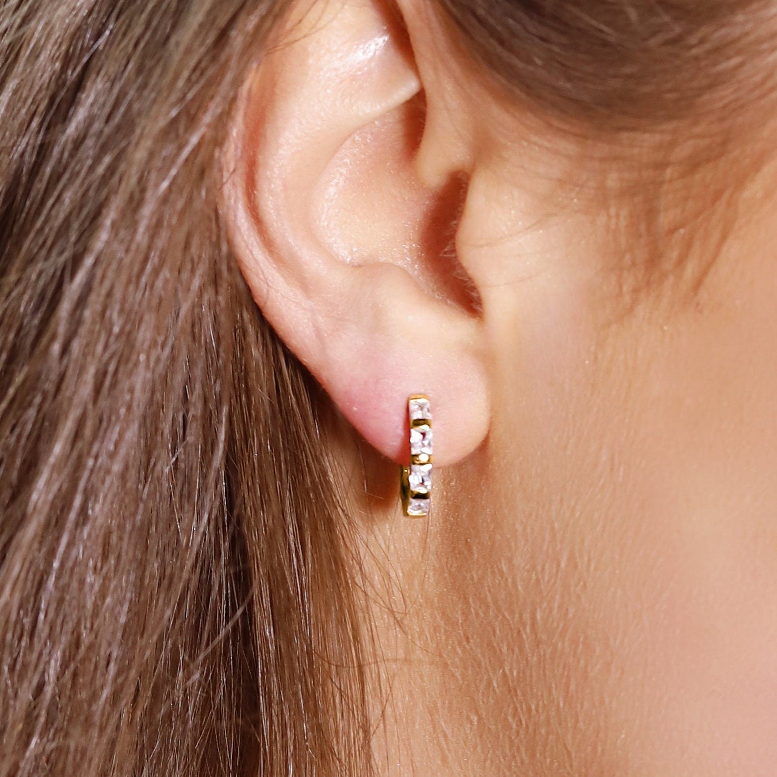 Small huggie hoop earrings. Gold huggie hoop earrings. Minimalist sterling silver hoop earrings. Baguette Huggie Hoops with Cubic Zirconia.