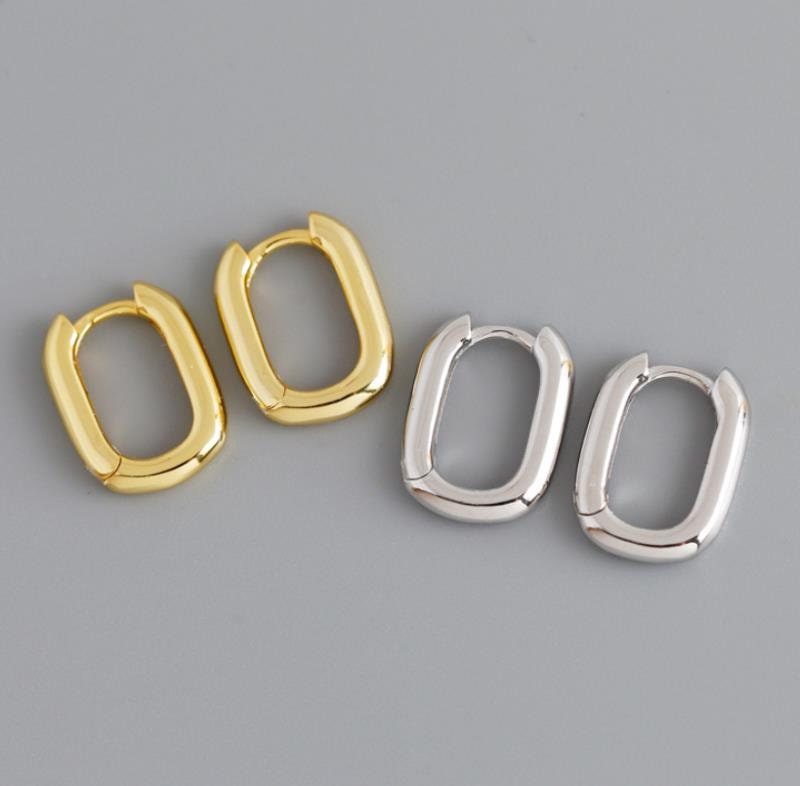 Silver and gold rectangular huggie hoop earrings by AJJ, small geometric dainty hoops for subtle, stylish ear jewelry.