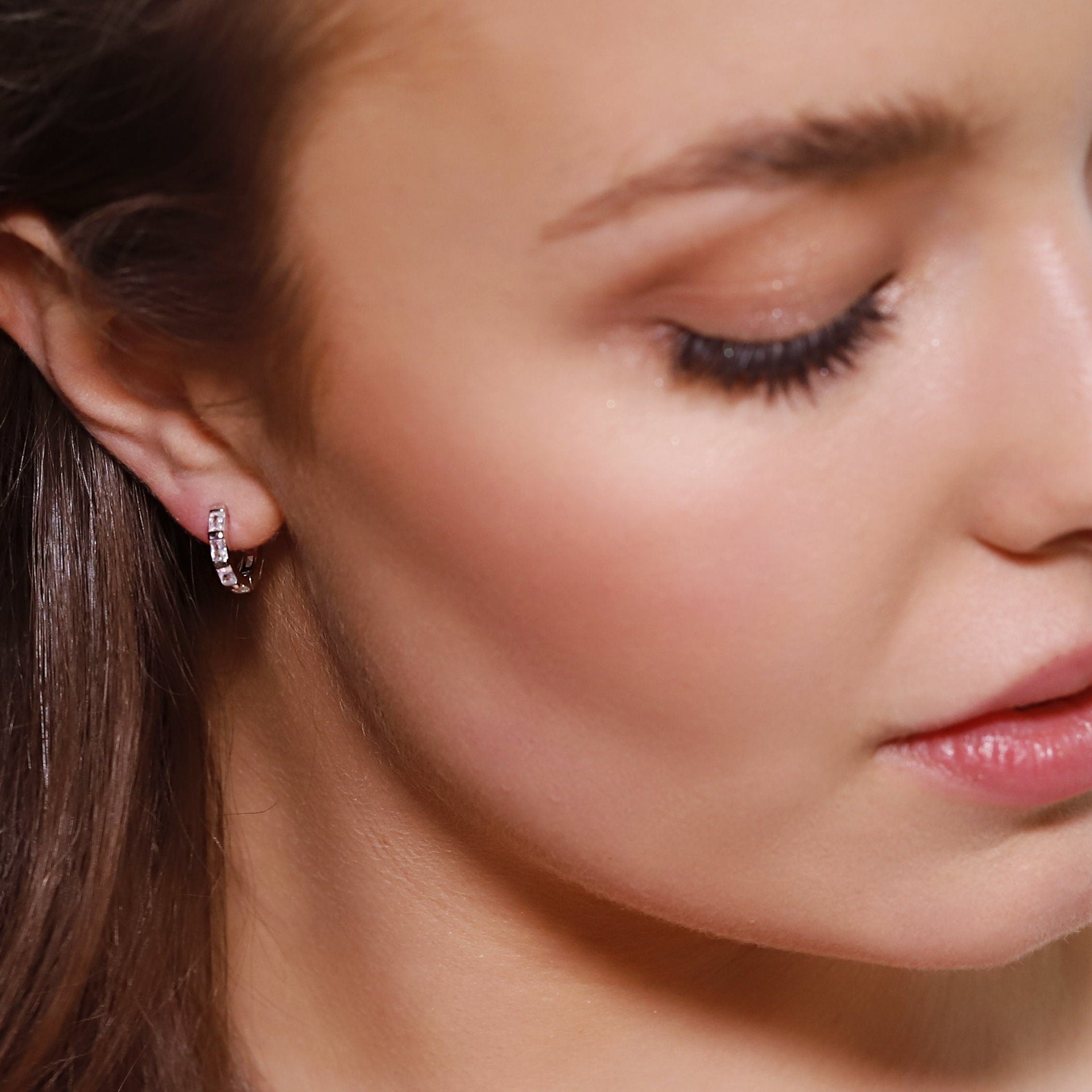 Small huggie hoop earrings. Gold huggie hoop earrings. Minimalist sterling silver hoop earrings. Baguette Huggie Hoops with Cubic Zirconia.