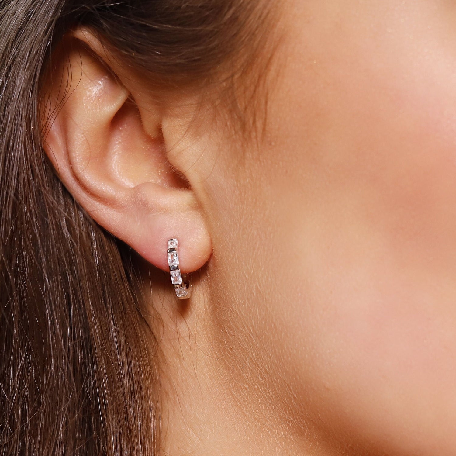 Small huggie hoop earrings. Gold huggie hoop earrings. Minimalist sterling silver hoop earrings. Baguette Huggie Hoops with Cubic Zirconia.