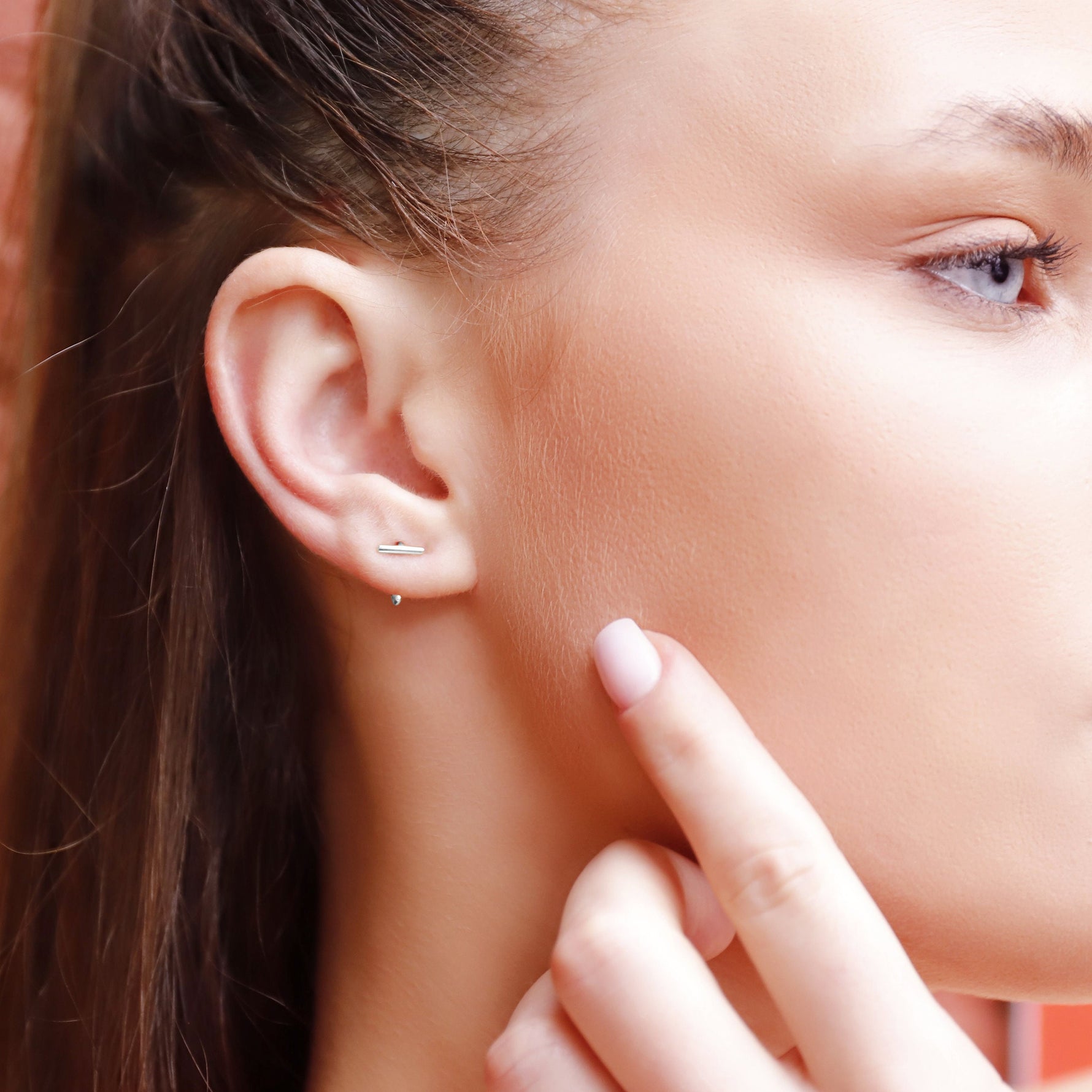 Small silver hoop earrings from AJJ's Elena collection, minimalist open and dainty hoop earrings for everyday wear.