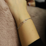 AJJ silver heart bracelet with dainty charm, perfect for women, featuring love hearts, ideal gift or stocking filler for girls.
