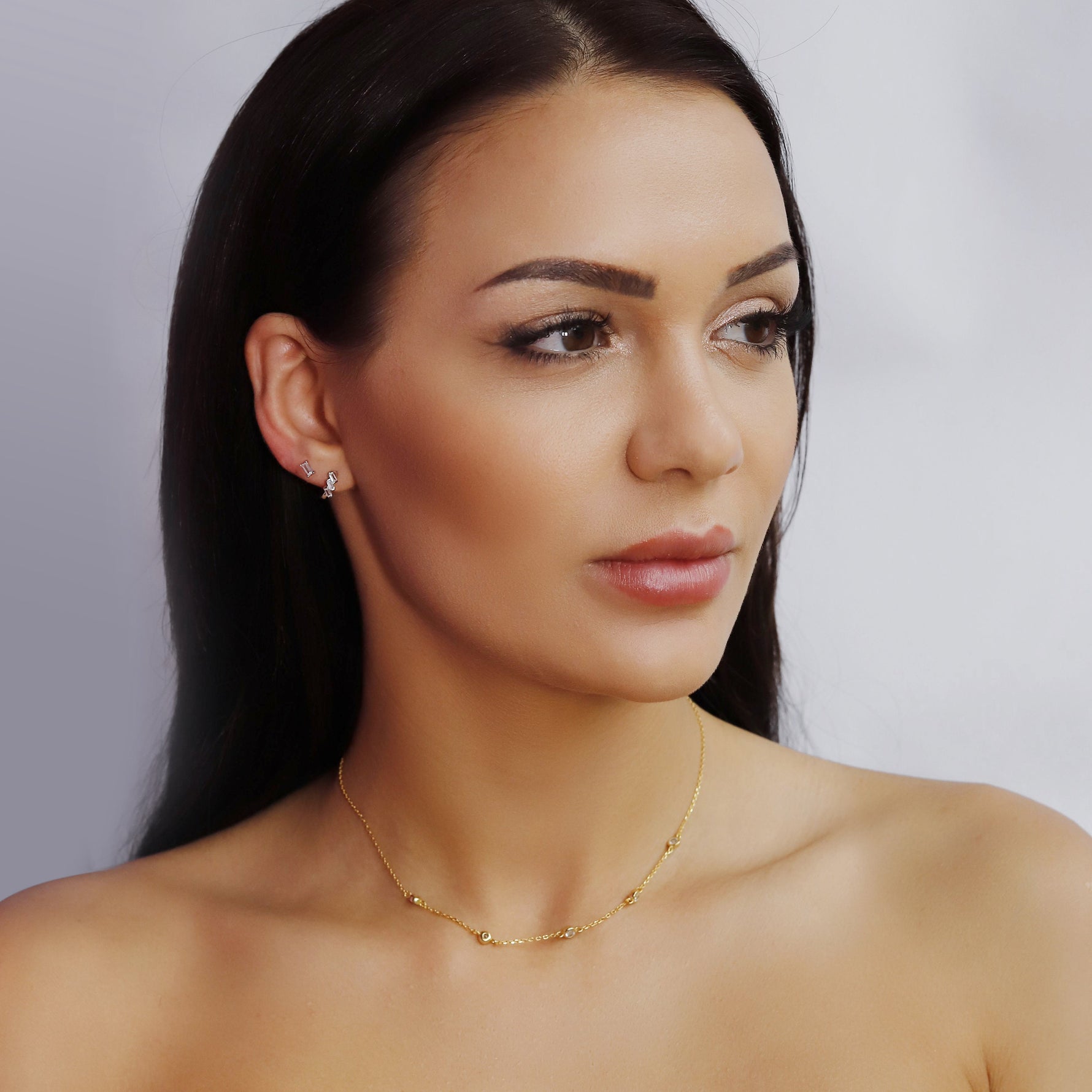 AJJ silver and yellow gold Huggie hoops earrings with baguette design, sterling silver 925 cartilage hoops.