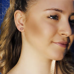 Sterling silver circle stud earrings with geometric design and crystal accents, stylish silver earrings by AJJ.