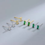 AJJ Heather tiny stud earrings with clear CZ diamonds, minimalist design, perfect for multiple piercings.