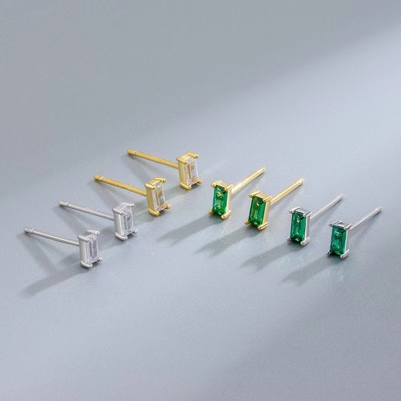 AJJ Heather tiny stud earrings with clear CZ diamonds, minimalist design, perfect for multiple piercings.