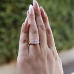 AJJ Dyla 2.5 ct emerald trilogy ring in sterling silver, featuring a stunning engagement design for women.