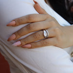 AJJ 2.5 ct emerald trilogy ring in sterling silver, featuring three vibrant emeralds and intricate band design.