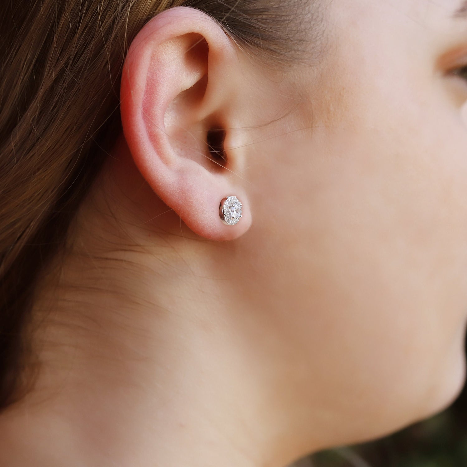 Elegant small round sterling silver cluster stud earrings for women with sparkling cubic zirconia by AJJ