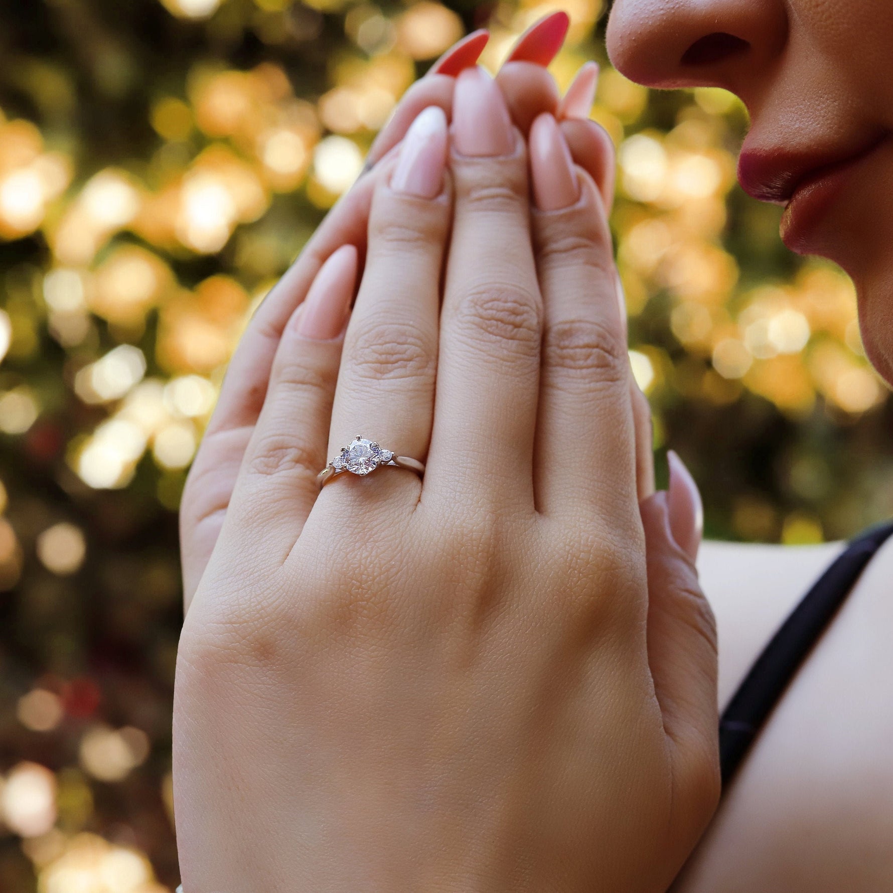 Sterling silver bridal engagement ring by AJJ featuring a sleek, elegant design perfect for promise or wedding jewelry.