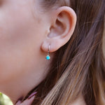 AJJ gold turquoise cartilage hoop earring with small hoop design, suitable for helix, tragus, and cartilage piercings.