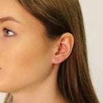 Sterling silver stud earrings by AJJ, small and dainty 925 silver earrings perfect for everyday wear, with a polished finish.